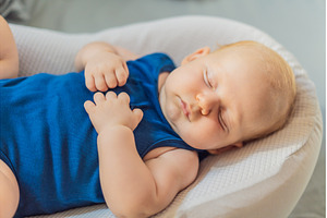 Chubby 3-month-old baby peacefully, a Person Photo by Elizaveta Galitskaya