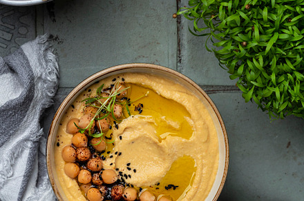 Traditional homemade chickpea hummus, a Food & Drink Photo by Marina_Pronina