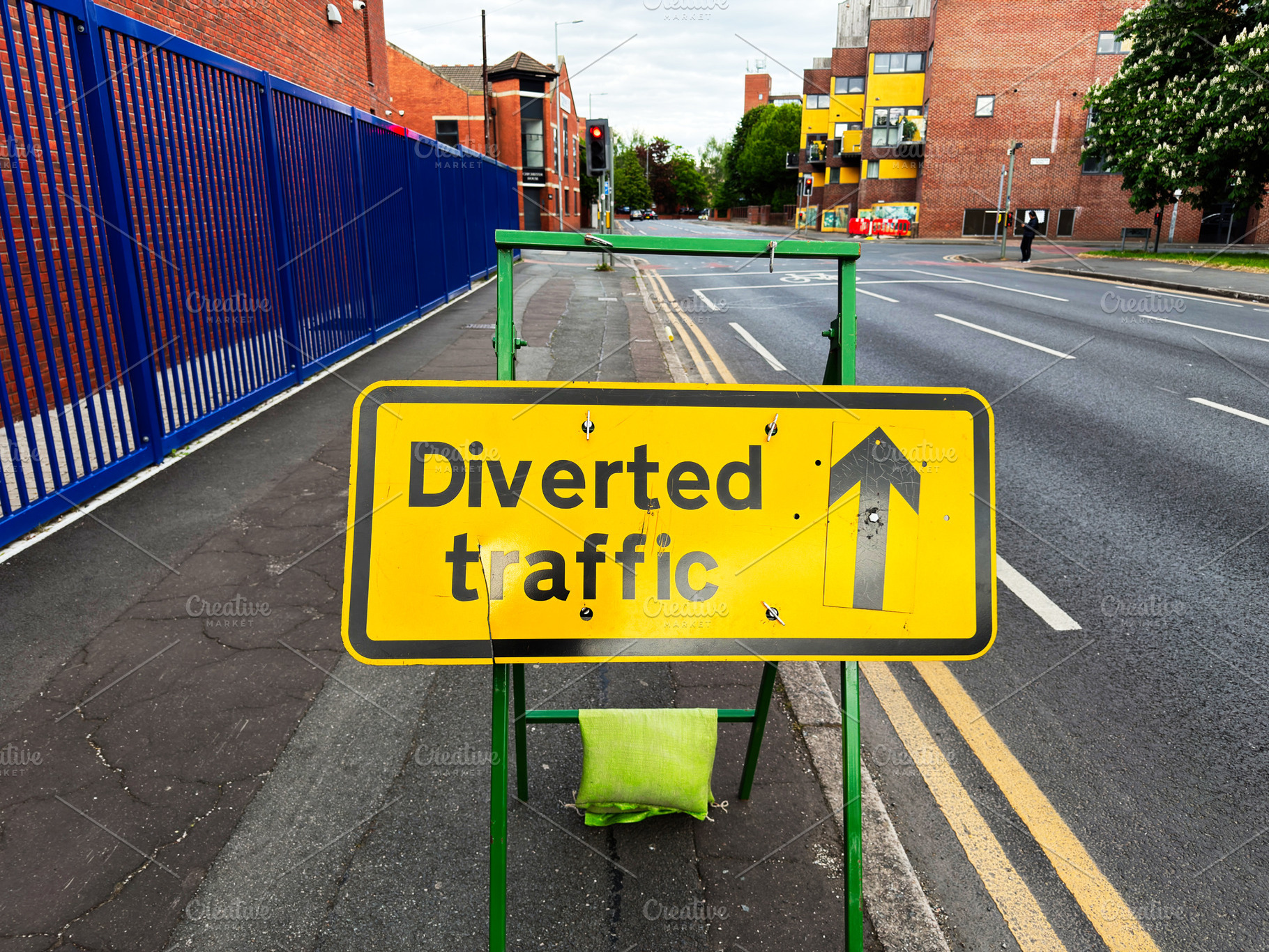Diverted traffic sign on a quiet urban street in Manchester UK i, a Photo by AS photostudio