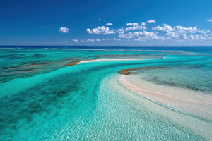 Aerial view of turquoise sea and white sandbar, a Nature Photo by AlyaAnd