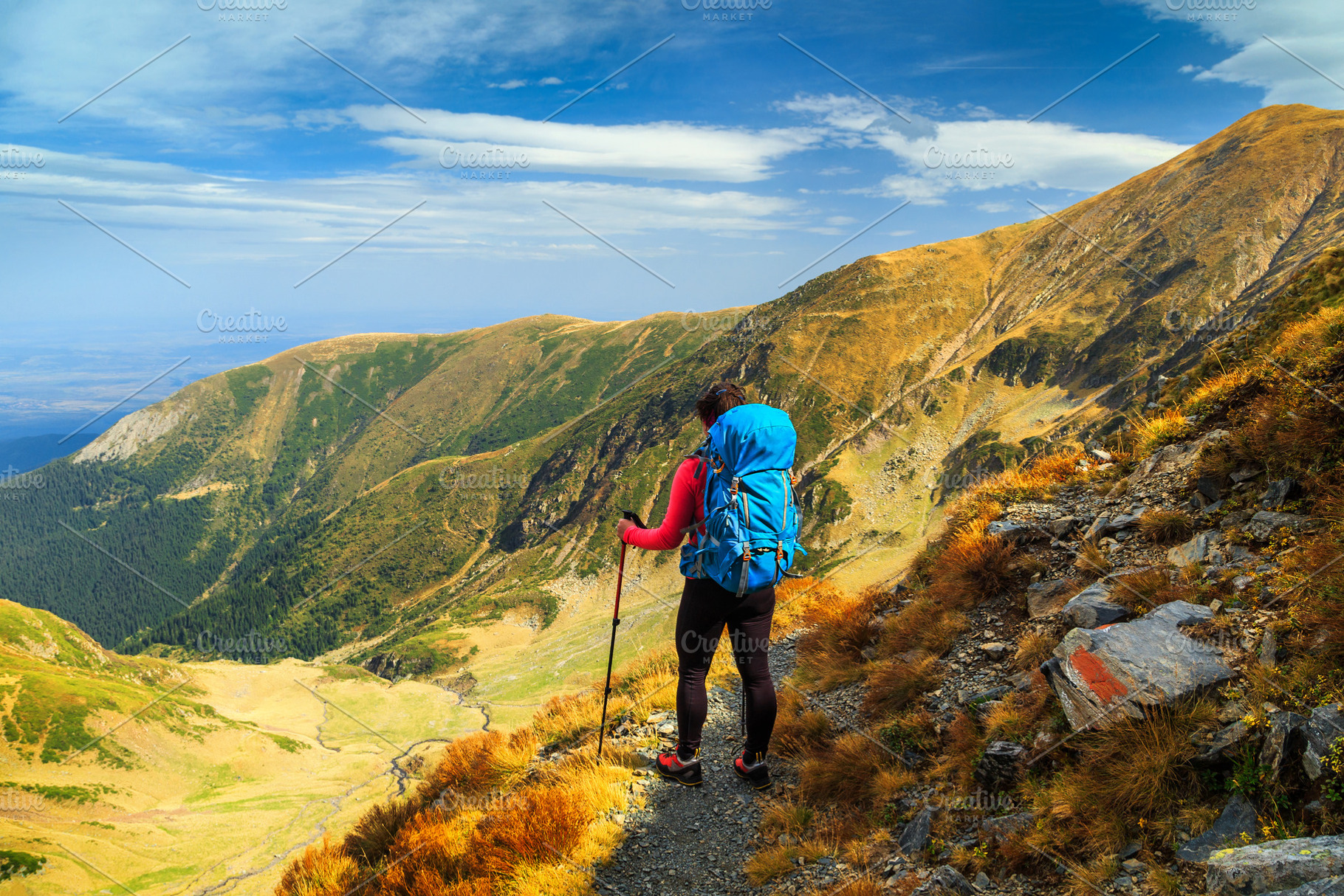 Hiker woman with backpack in Fagaras, a Sports & Recreation Photo by Alpine Dreams