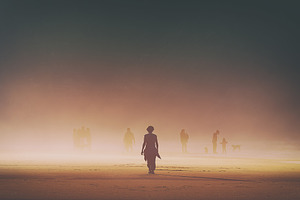lonely woman walking on beach