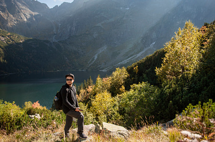 Young man traveler with map and backpack, a Sports & Recreation Photo by Olena Rudo