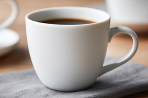 Blank white ceramic mug filled with, a Food & Drink Photo by MistyDay