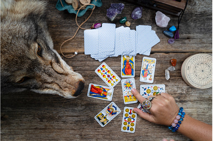 Fortune telling on tarot cards, an Abstract Photo by Neirfy