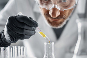 Focused scientist in protective, a Health & Medical Photo by MistyDay
