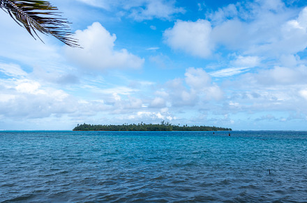 View of Motu Araara from Huahine, French Polynesia, across the l