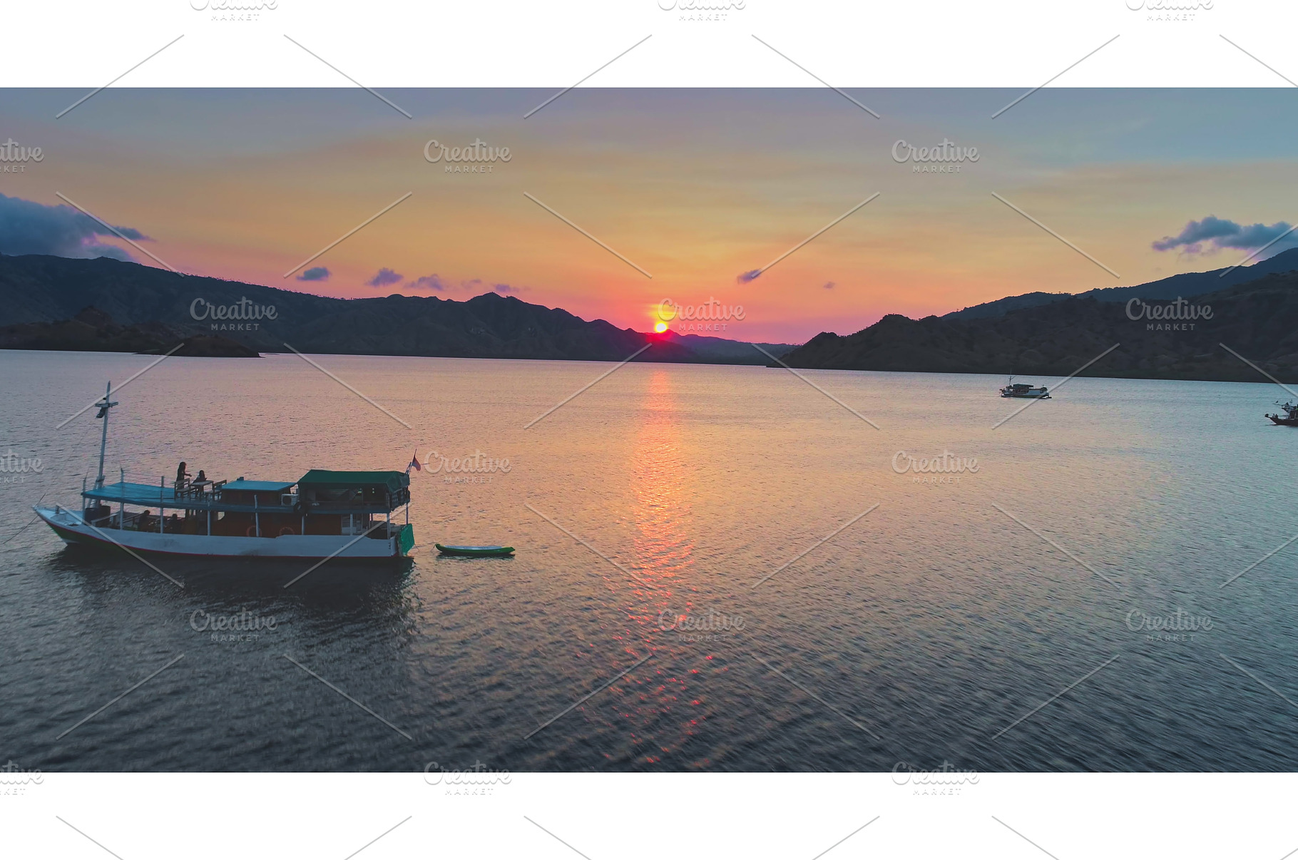 Tourist boats enjoying sunset in, a Transportation Photo by Goinyk