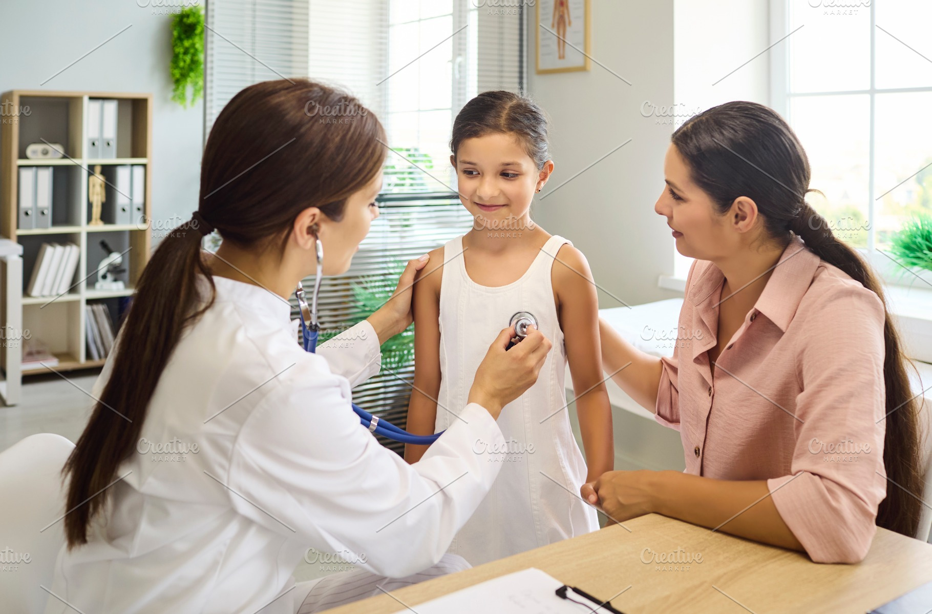 Pediatrician Examining Girl with Mom, a Person Photo by StudioRomantic