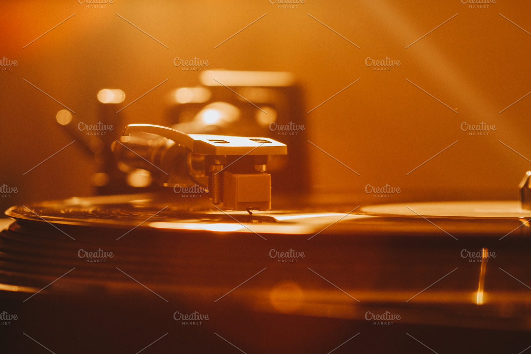 Close up of turntable needle on a vi featuring 70s, 80s, and album, a Technology Photo by telnyaw