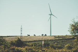 Wind turbine in rural landscape, a Technology Photo by SkyNext