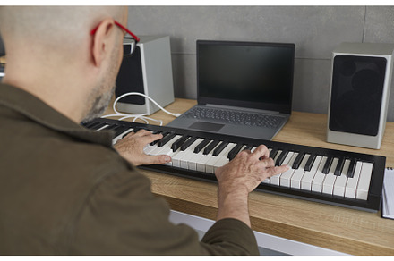 Man is rehearsing while playing on, a Person Photo by StudioRomantic