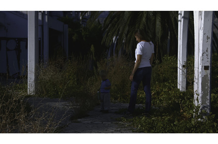 Woman follows child on walk in, a Person Photo by Media Whale Stock