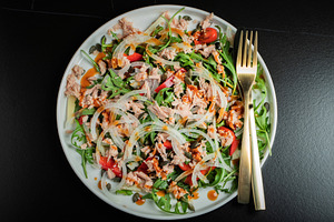 Fresh Tuna Salad with Onions and Cherry Tomatoes. Italian Mediterranean Cuisine, a Food & Drink Photo by Budarinphoto