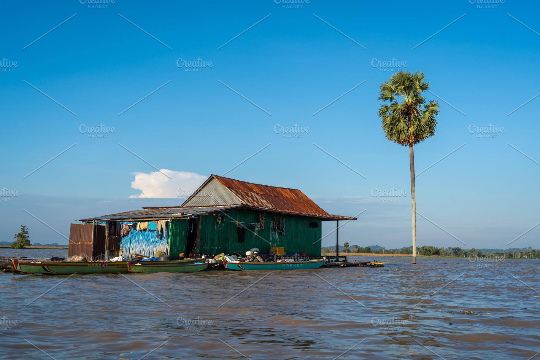 Traditional Bugis floating house on Lake Tempe, Sulawesi, Indone, an Architecture Photo by GoodGoods