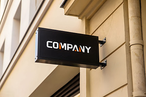 Logo Mockup Black Hanging Sign, a Mockup by GenesisCreativeCo