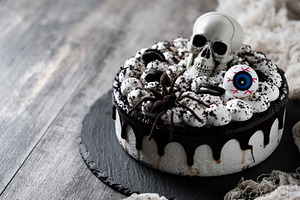 Spooky Halloween chocolate Cake with Skull, Eyeball, and Spider Decoration, a Food & Drink Photo by etorres69
