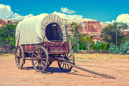 Covered wagon featuring vintage, wild west, and ancient