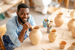 Smiling Black Male Potter with Handmade Vases, an Arts & Entertainment Photo by Davizro's Market