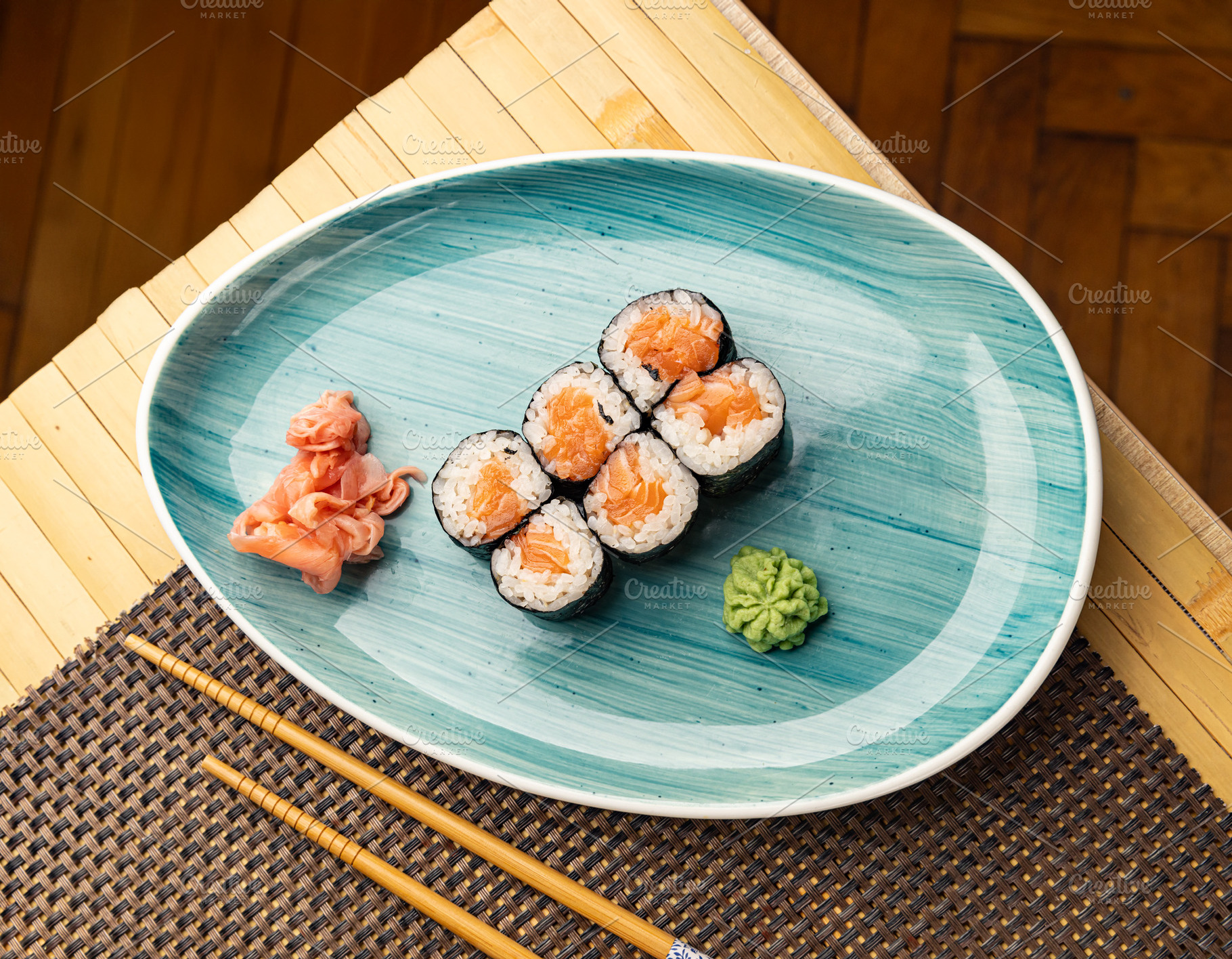 Fresh hosomaki rolls, filled with salmon, a Photo by Grafvision photography