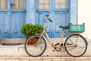 Old bicycle on the street in Greece, a Transportation Photo by BOOCYS