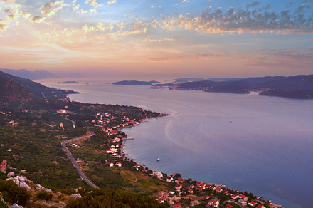 Sea sunset, Croatian islands and Viganj village on seashore (Pel, a Nature Photo by YuriyB