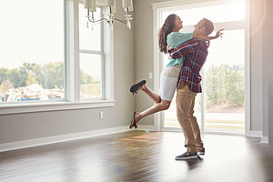 Stepping into their new life together, a Photo by Peopleimages.com