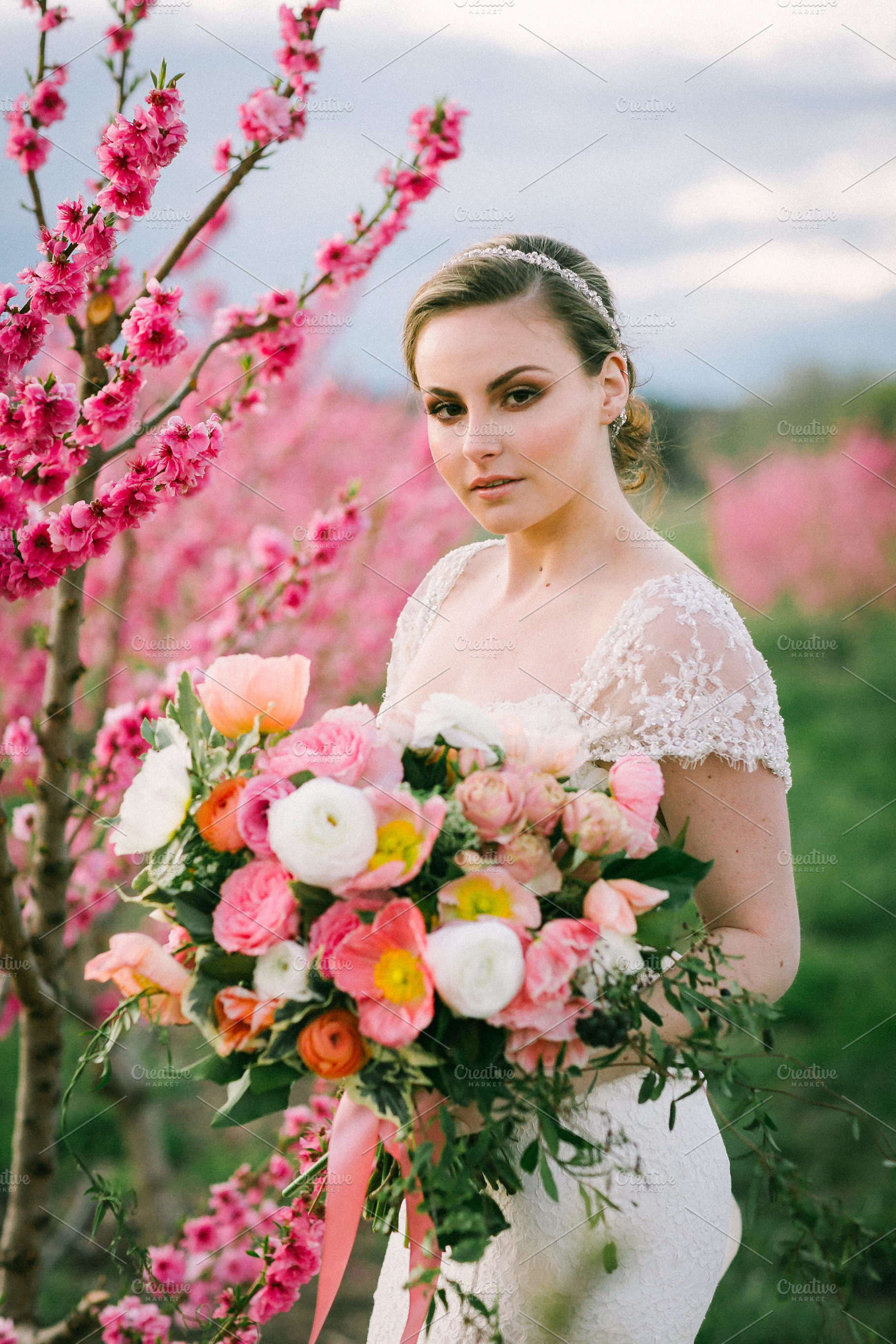Spring Weddin Bride in Blossom field, a Person Photo by Shae Estella Photo