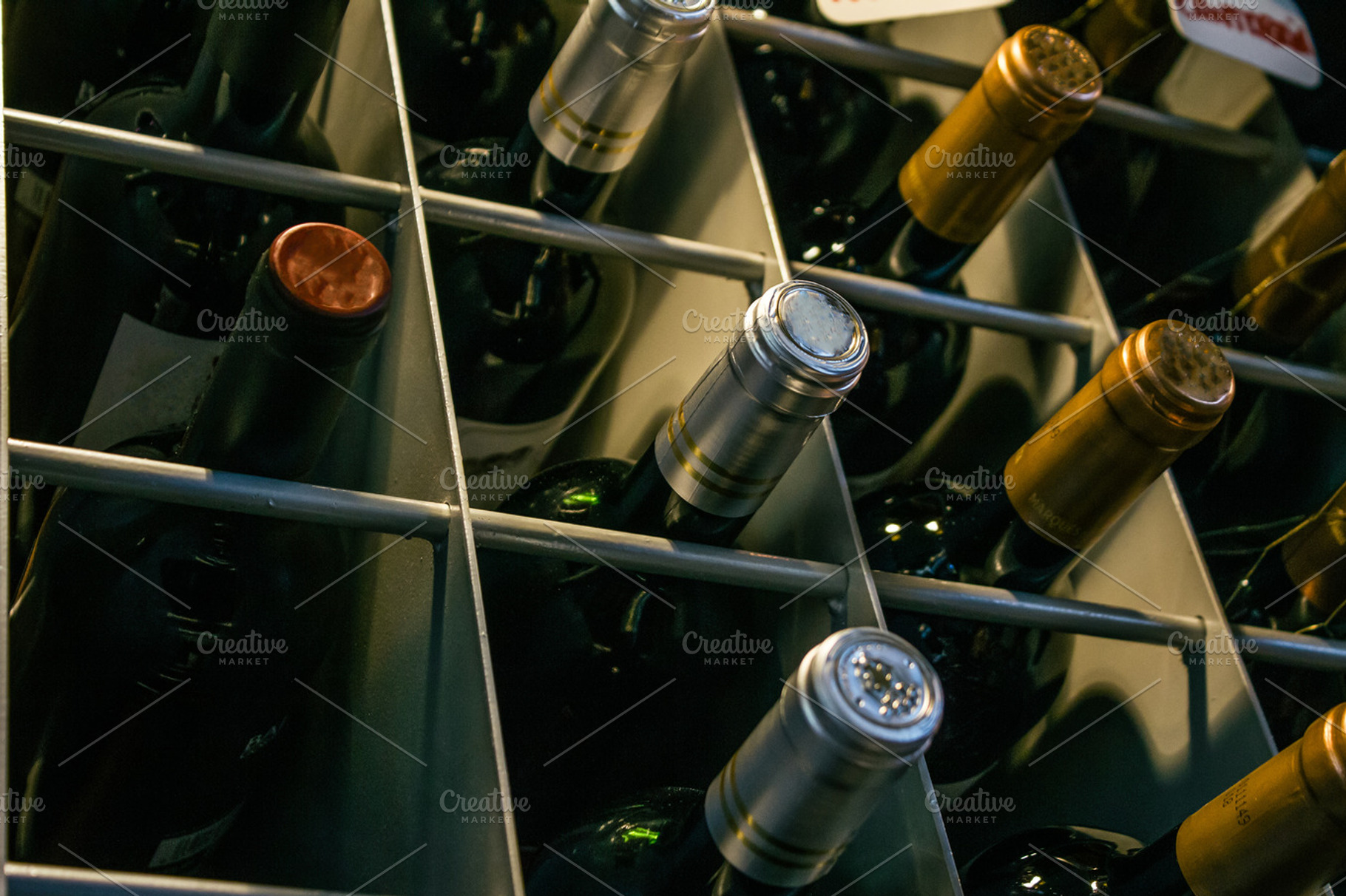 Bottles of wine in a cellar, a Food & Drink Photo by Am.Benitez Estudio