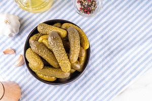 Homemade pickles, pickled gherkins or cucumbers, a Food & Drink Photo by Rimma