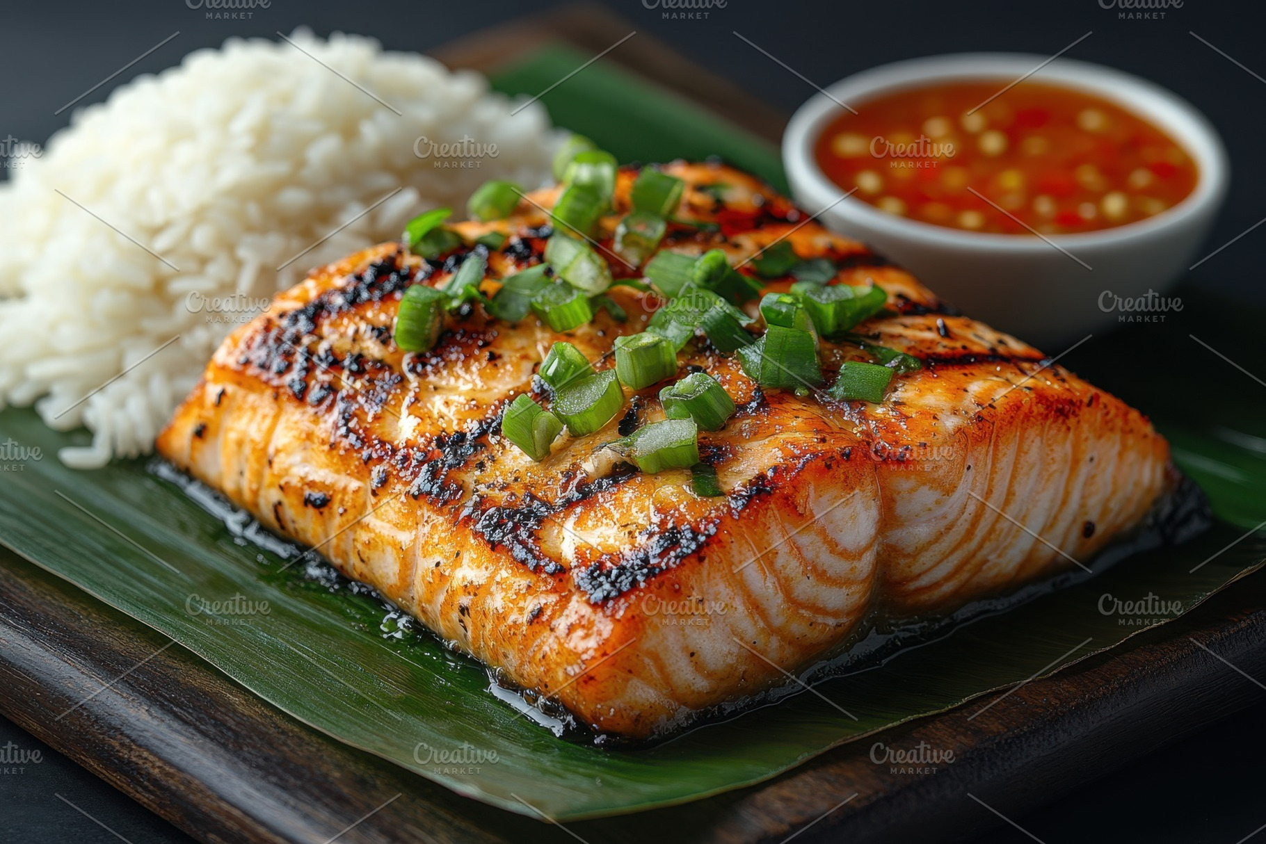 Grilled salmon fillet served with ri, a Photo by Tanuart