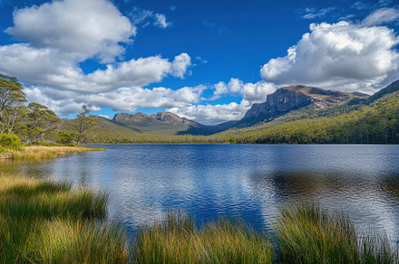 Panoramic view of serene lake and mo, a Photo by Iftikhar Alam