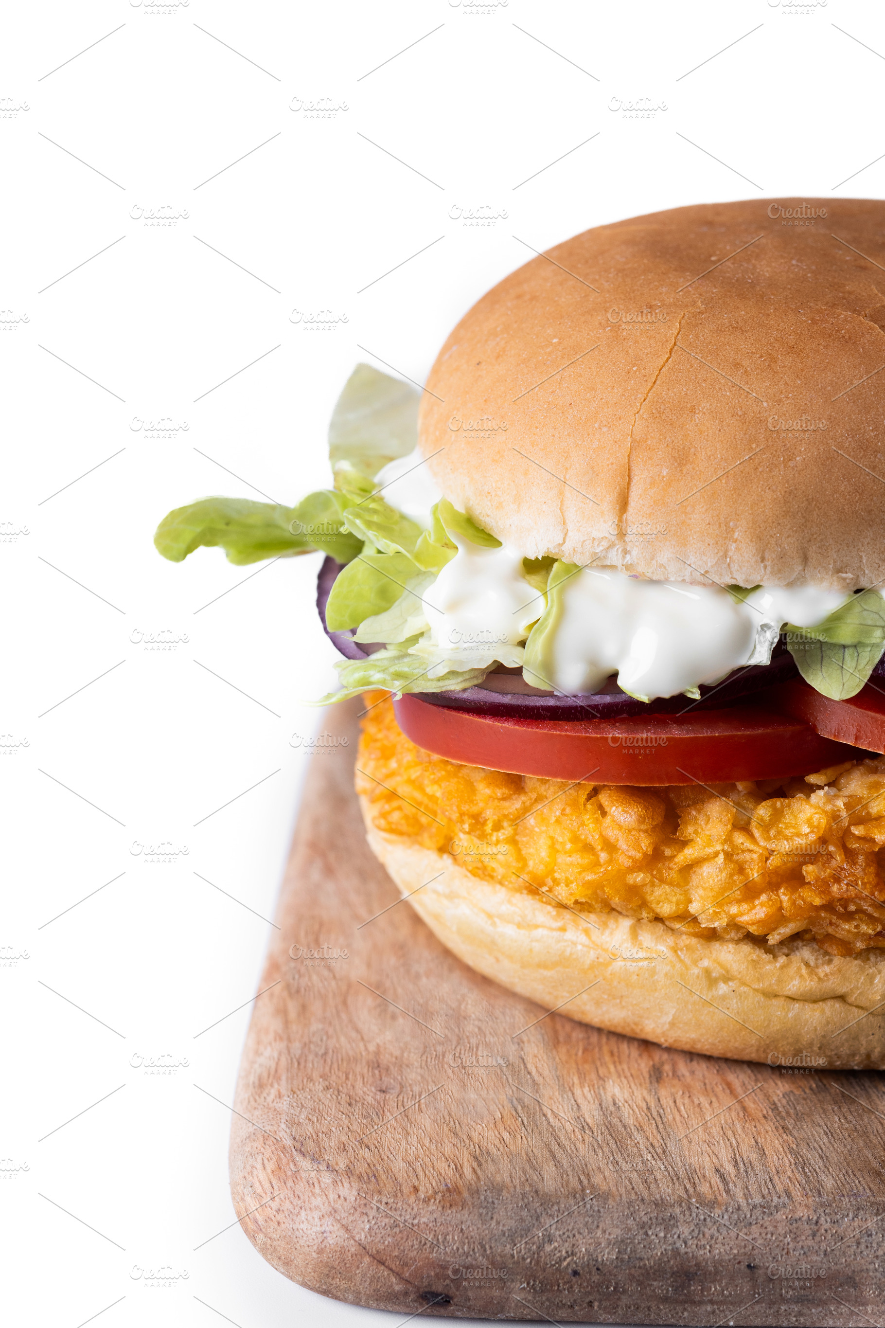 Closeup of crispy chicken burger, a Food & Drink Photo by etorres69