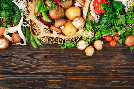 Reusable shopping textile bags full of organic spring vegetables, a Food & Drink Photo by 5PH
