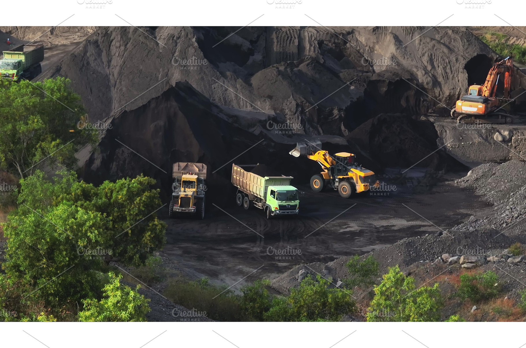 Heavy machinery excavating coal in, an Industrial Photo by Goinyk