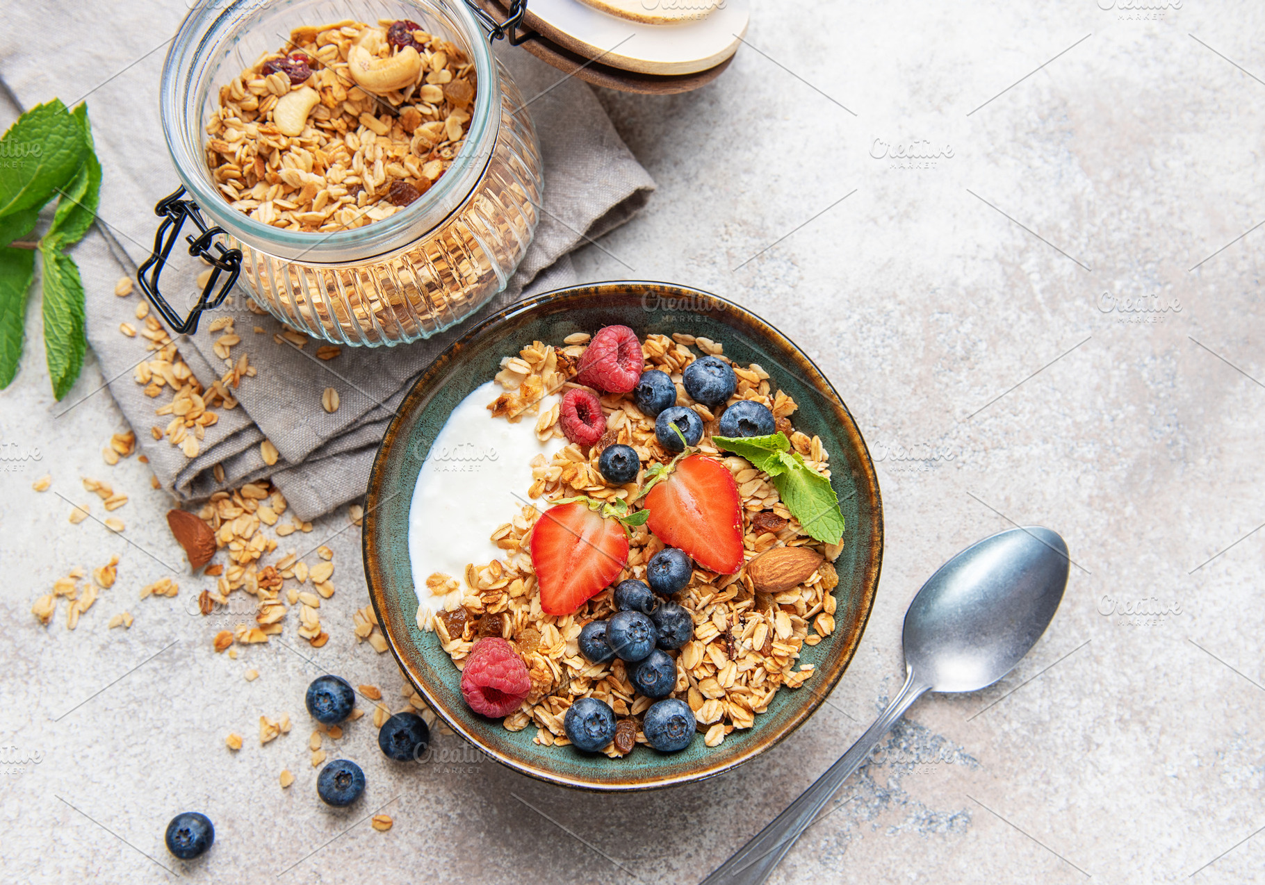 Healthy breakfast granola bowl with fresh berries, a Food & Drink Photo by Olena Rudo