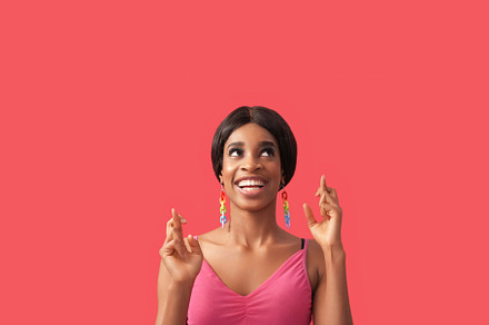 Good luck wish gesture happy woman crossed fingers, a Person Photo by Photo Drive Studio