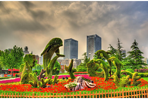 Figures in Huangpu Park - Shanghai, an Architecture Photo by Leonid Andronov