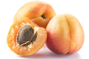 Ripe apricots isolated on the white, a Photo by Volff