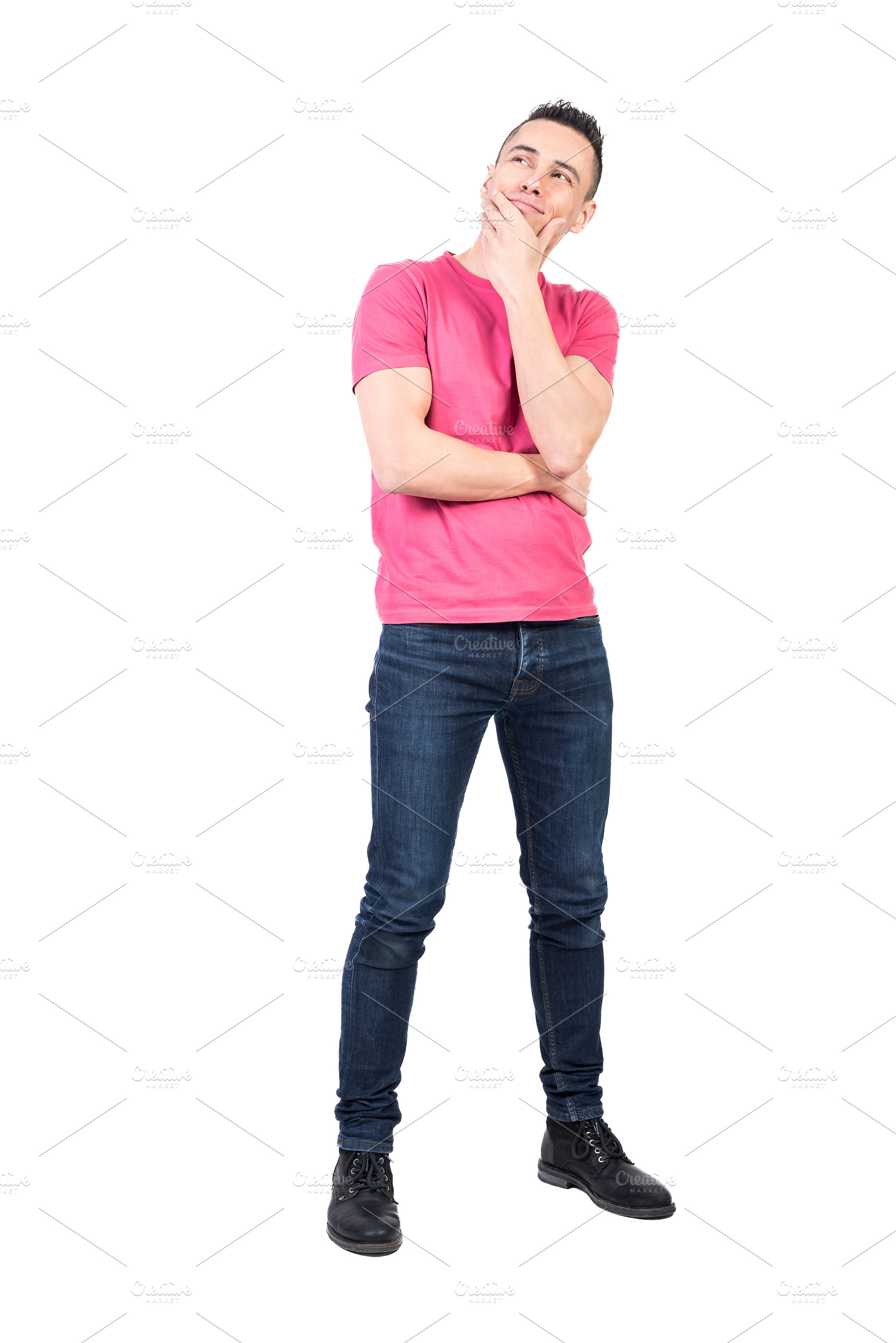 Positive man in casual outfit touching chin and thinking, a Background Photo by Iván Moreno STOCK PHOTO