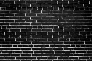 Painted black brick wall. in a row.