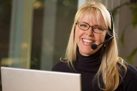 Attractive businesswoman with phone containing agent, assistant, and, a Person Photo by Andy Dean Photography
