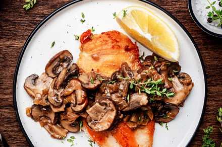 Fried chicken breast with mushrooms and onion sauce with white w, a Food & Drink Photo by 5PH