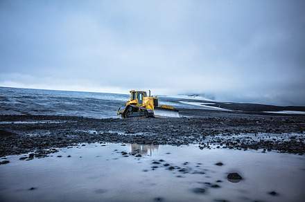 Yellow bulldozer in iceland containing iceland, desert, and nobody