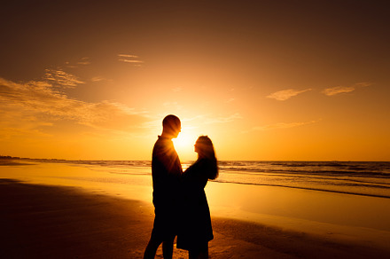 Couple in love silhouette in sunset