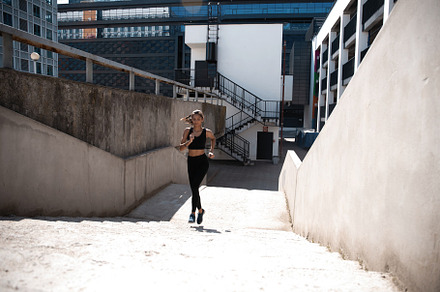 healthy young woman running outdoor, a Sports & Recreation Photo by OPOLJA