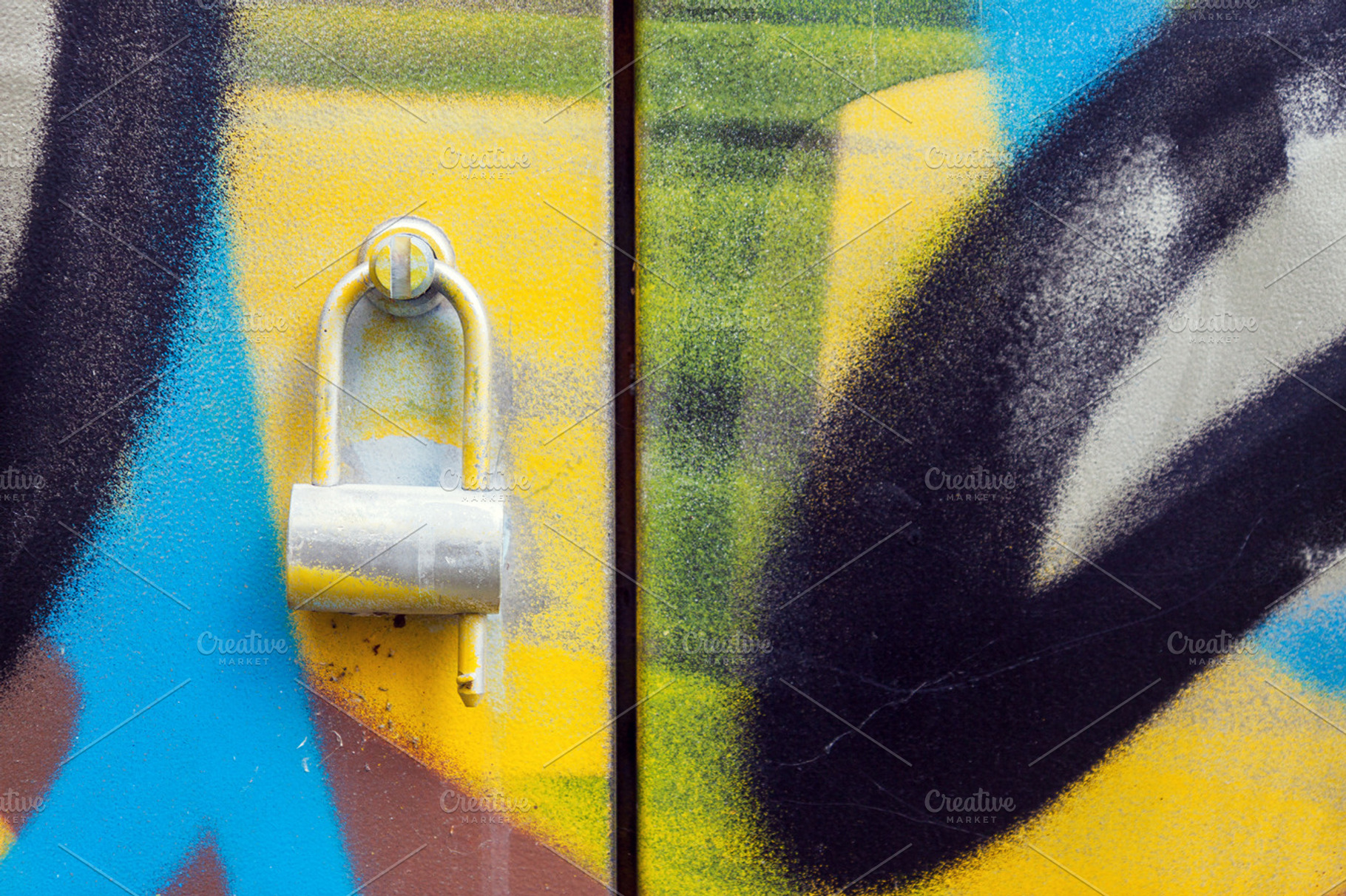 Graffiti painted doors with lock, an Arts & Entertainment Photo by BOOCYS