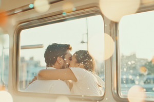 Romantic moment of a couple kissing, a Photo by Dvoevnore photos