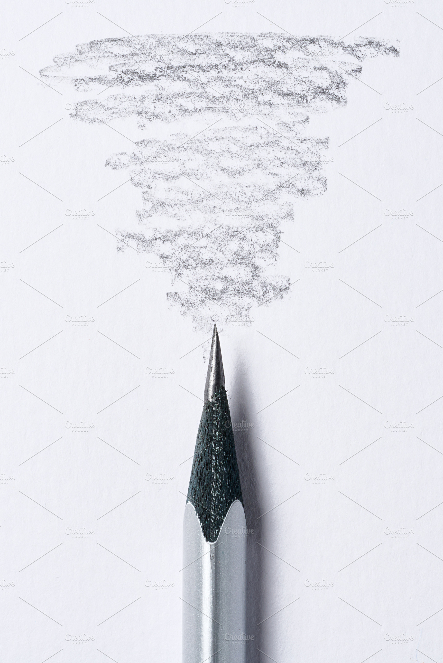 Simple pencil and gray graphite stroke on white paper, a Background Photo by ndanko
