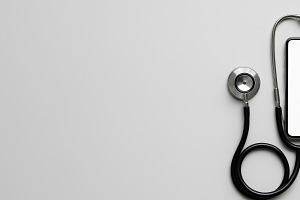 Stethoscope and smartphone on gray b, a Photo by Dvoevnore photos